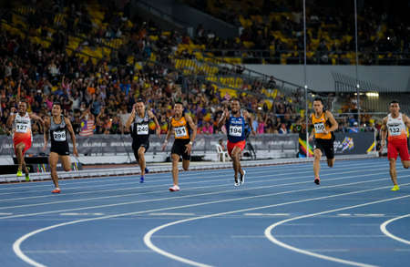 KUALA LUMPUR, MALAYSIA - AUGUST 24, 2017 : Malaysia 100M athlete, Khairul Hafiz Jantan win gold medal during 29th Southeast Asian Games (SEA Games) at Bukit Jalil Stadium.のeditorial素材