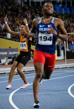 KUALA LUMPUR, MALAYSIA - AUGUST 24, 2017 : Malaysia 100M athlete, Khairul Hafiz Jantan win gold...
