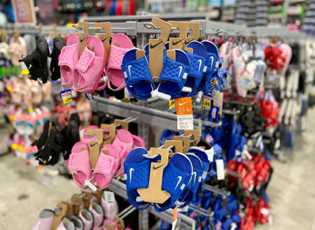 Kuala Lumpur, Malaysia - May 18, 2020 : Close up of women Nike kid slipper on display in local sports outletのeditorial素材