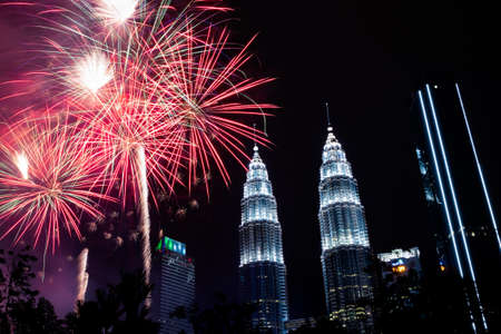 Kuala Lumpur, Malaysia - Circa 2019 : Fireworks show in the park next to Petronas Twin Tower.