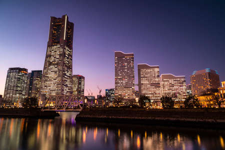 Sunset at the waterfront in urban city in Japan.の写真素材