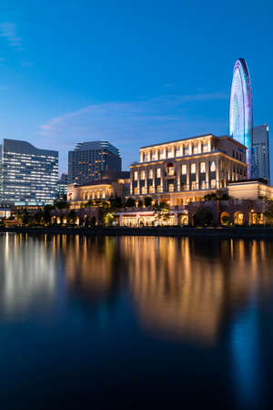 Minato Mirai, Yokohama - September 30, 2019 : Cityscape in Minato Mirai during blue hour. Portrait...