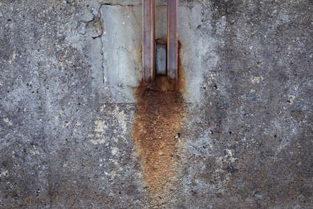 Rusted steel in the concrete. Texture and background.の写真素材