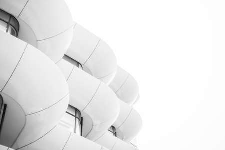 Modern architecture of a building in the city. Curves and straight lines. Minimal futuristic design....