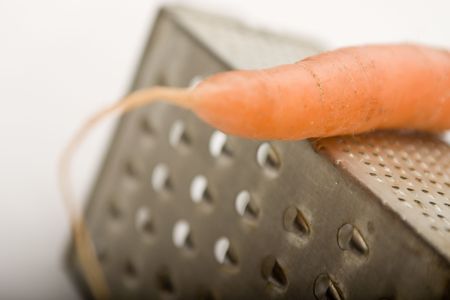 Carrot on the old grater 2の写真素材