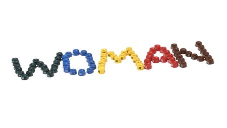 a word _woman_ combined from different size washersの写真素材