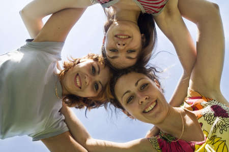 three playmates on the blue skyの写真素材