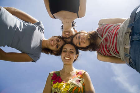 four friends on the blue skyの写真素材