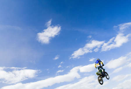 motocross rider in the airの写真素材