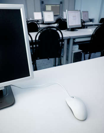 interior of computer class with blue tintの写真素材