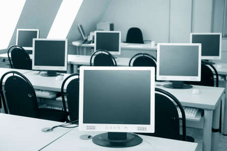 six monitors in a computer classの写真素材