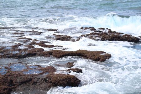 Waves crashing on rocks on the Mediterraneanのeditorial素材