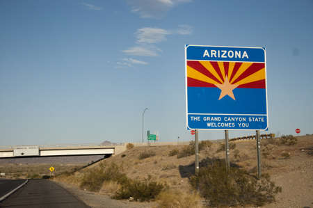 Welcome to Arizona State sign with the highway as background.のeditorial素材