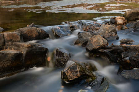Rocks in the creek taken with slow shutterの写真素材