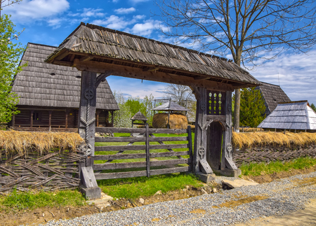 Romanian traditional wooden gate in Maramures region, Romaniaの写真素材