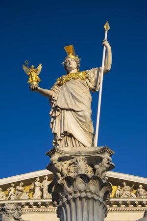 Statue of Pallas Athena in front of the Austrian Parliament in Viennaの写真素材