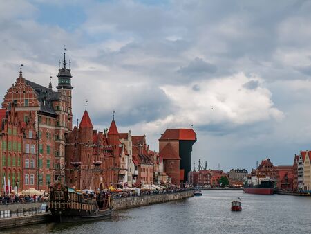 Quay of Motlawa river with colourful historic houses in Gdansk, Poland. Gdansk is a famous travel...
