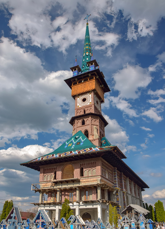 Traditional maramures neo-gothic church on Merry Cemetery in Sapanta village, Romaniaの写真素材