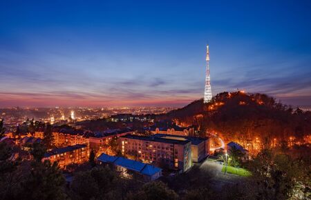 Amazing panoramic view of High Castle hill with TV tower and old quarters in historical city center...