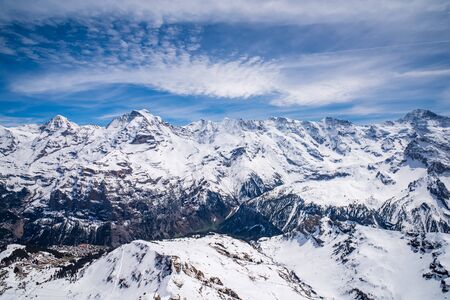 Panoramic view of famous peaks Monch, Jungfrau, Gletscherhorn, Grosshorn and Breithorn in Swiss Alps, Switzerlandの写真素材