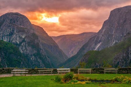 Incredible sunrise over Stalheim, Hordaland, Norway. Picturesque view from terrace on steep mountains and burning sky. Stalheim is a popular travel destination in Western Norwayの写真素材