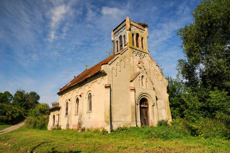 Ruins of the Roman Catholic Church of Our Lady of the Rosary, Medukha, Ivano-Frankivsk region, Ukraine at sunny summer day. Picturesque skyの写真素材