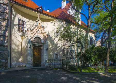 Old gothic church in sunlight on Suchona square at old citycenter of Bratislava, Slovakia.の写真素材