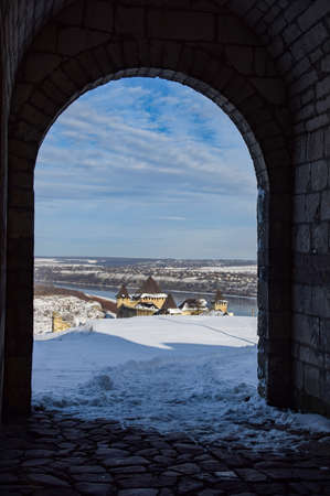 View from arch of entrance Bender Gate to medieval Khotyn fortress, Chernivtsi region. Ukraine at sunny winter day. Khotyn fortress is s popular travel destination in Ukraineの写真素材