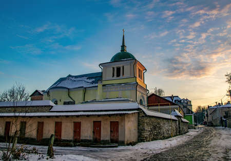 Peter and Paul Church in Kamianets-Podilskyi, Ukraine during sunset. Kamianets-Podilskyi is one of...