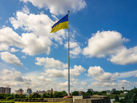 Biggest National Flag of Ukraine on tall flagpole in dowmtown of Kyiv, capital of Ukraine....