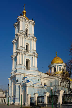 Scenic view of Transfiguration Cathedral in Sumy, Ukraine. Tall baroque bell tower and classic nave. Sumy is a popular travel destination in Ukraineの写真素材