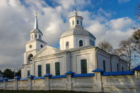 Scenic view of histirical white Annunciation Church in Trostyanets,, Sumy region, Ukraine illuminated with sunlightの写真素材