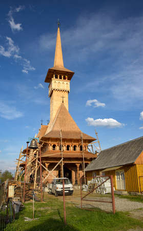 Construction of traditional maramures wooden neo-gothic church in Sapanta village, Romania.の写真素材