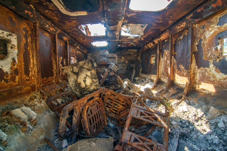 Inside the destroyed russian military armored car during Russian invasion of Ukraine in 2022.のeditorial素材