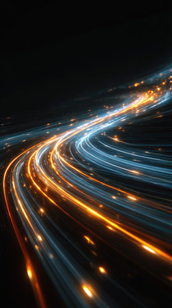 Dynamic abstract image features glowing light trails of orange and blue hues against a deep black background. The composition emphasizes lines and motion, suggesting speed. Ideal for visual communication projects, it offers versatile applications in design or editorial content with an emphasis on energy.の素材