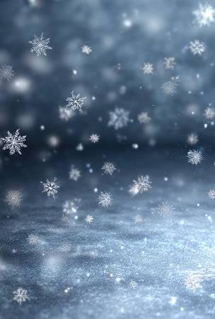 This image features a composition of falling snowflakes on a textured surface. The scene presents soft focus and blurred background elements creating a sense of depth. The color palette primarily uses blues, greys and whites. This image is suitable for a variety of designs and commercial applications.の素材