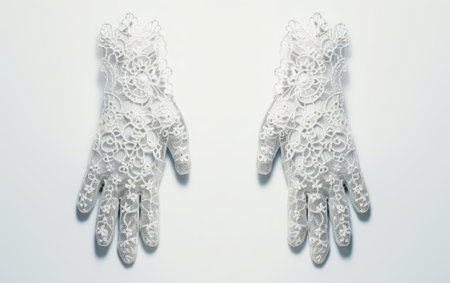 Beautiful White Color Printed Lace Gloves Isolated on White Backgroundの素材