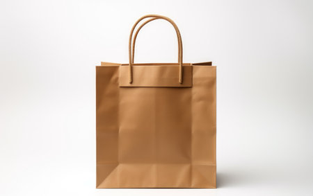 Splendid Golden Color Paper Bag Isolated on White Backgroundの素材
