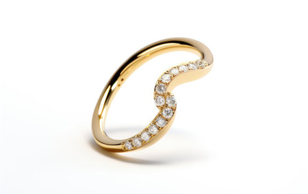 Gold and Diamond Nose Ring in a Crisp White Scene Isolated on White Backgroundの素材