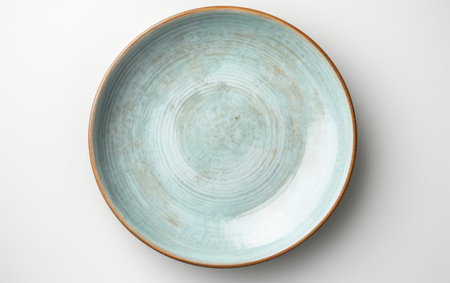 Exploring the Graceful Design of an Isolated Ceramic Plate Isolated on White Backgroundの素材