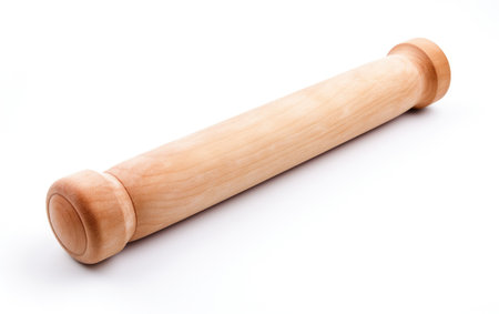 A Glimpse into the Clay Rolling Pin Crafting Precise Shapes for Creative Endeavors Isolated on White Backgroundの素材