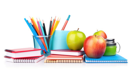 Stack of Books Pencils and Apples on Table. A neat stack of various books sharpened pencils and bright apples arranged on a wooden table. The books vary in size and color the pencil are ready for use.の素材
