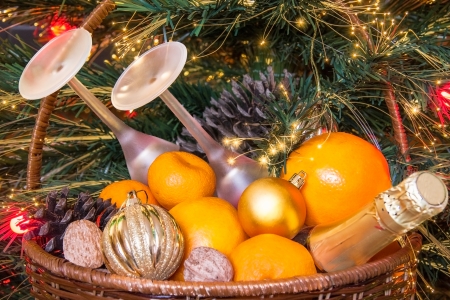 Basket for a picnic under the Christmas treeの写真素材