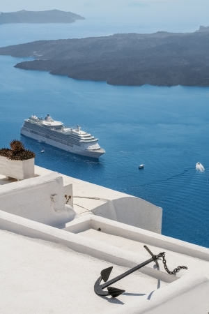 View to the sea and volcano from Fira the capital of Santorini island in Greeceの写真素材