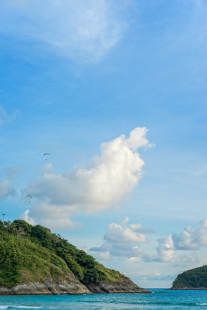 Landscape with a sea shore and a blue sky with white clouds, Phuket island, Thailandの写真素材
