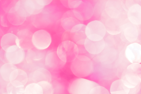 Pink and white luminous bokeh. Abstract festive background の写真素材