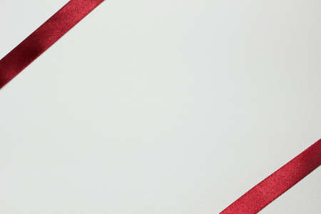 White paper and red tapeの写真素材