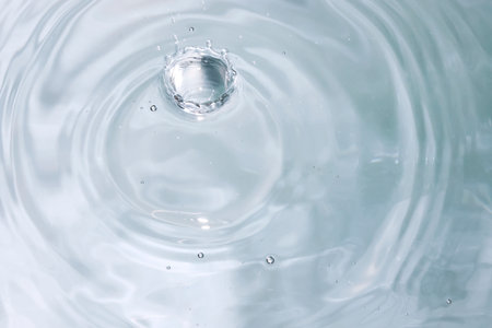 drop of water on a white background. close-up. macroの写真素材