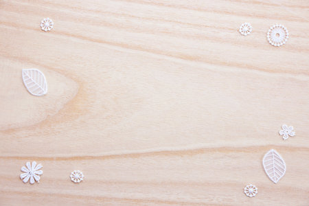 Wooden background with snowflakes. Top view. Copy space
