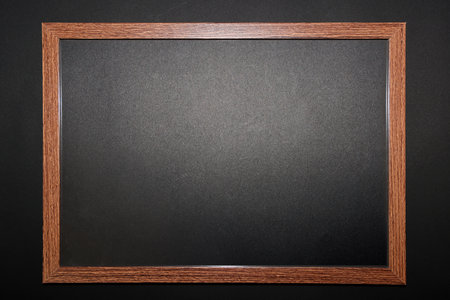 wooden frame isolated on black background,
